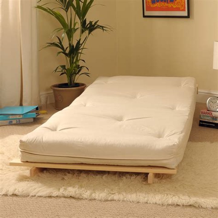 Can a regular mattress be used on a futon frame