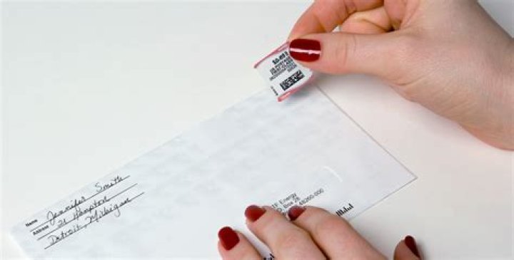 Can I glue a stamp on an envelope?