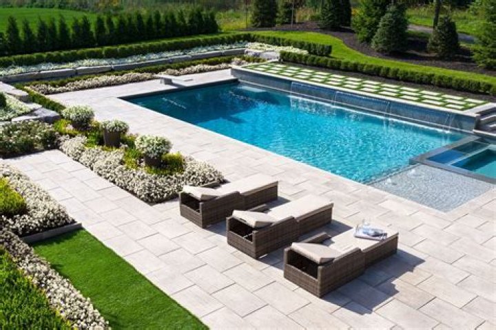 Can you put pavers over concrete around a pool?