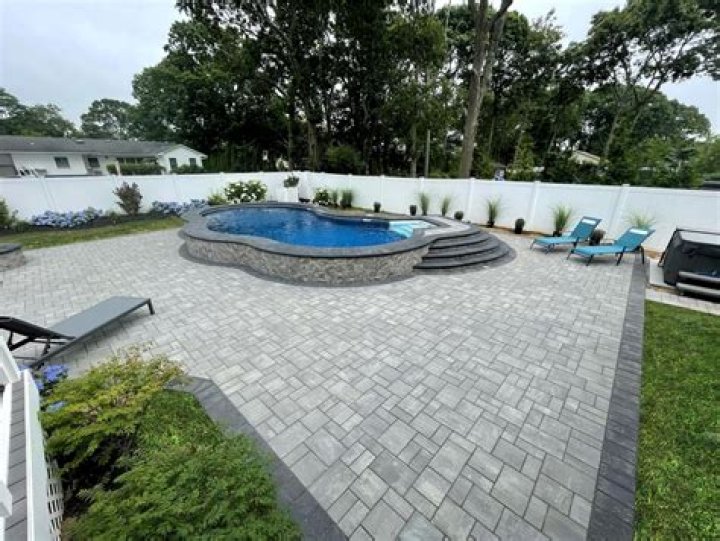Can you put pavers over concrete pool deck