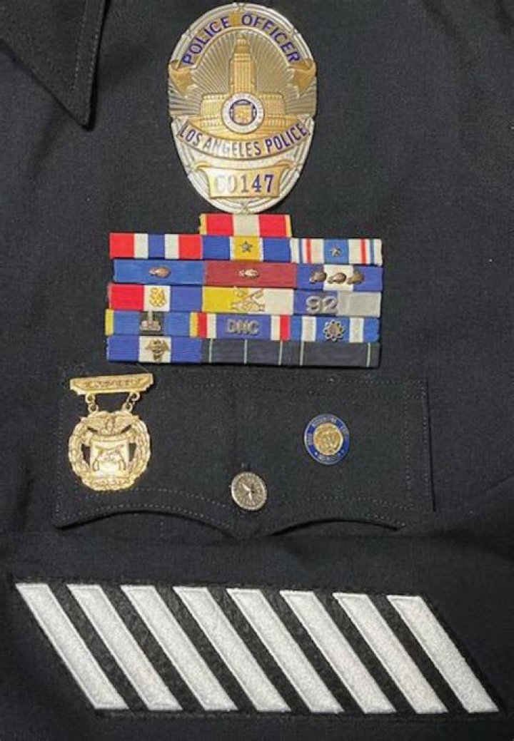 Do warrant officers wear service stripes
