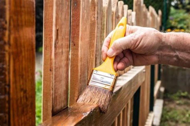 Does staining your fence make it last longer