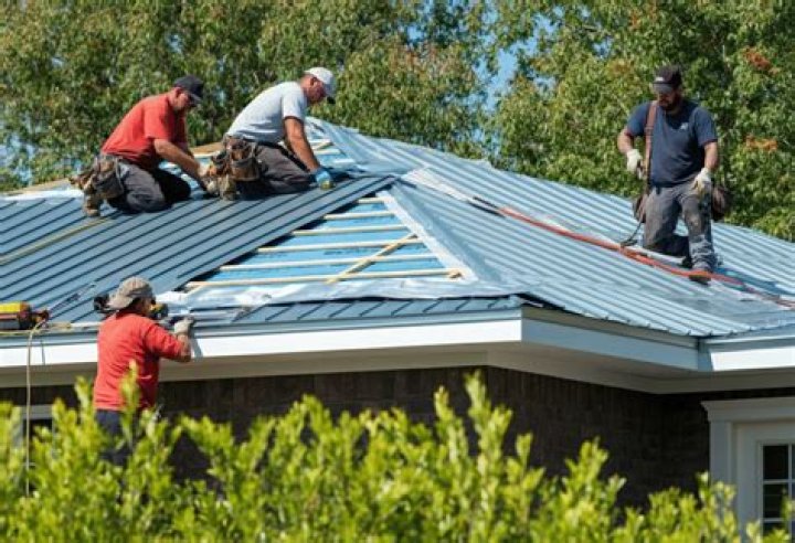 How do I install metal roofing over shingles