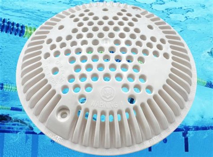 How do I remove my pool drain cover