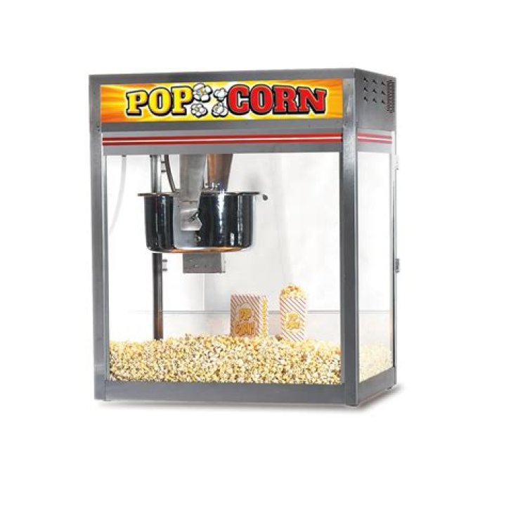 How do you clean a gold medal popcorn machine?