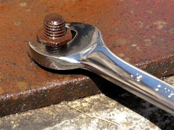 How do you loosen a bolt without a socket wrench?