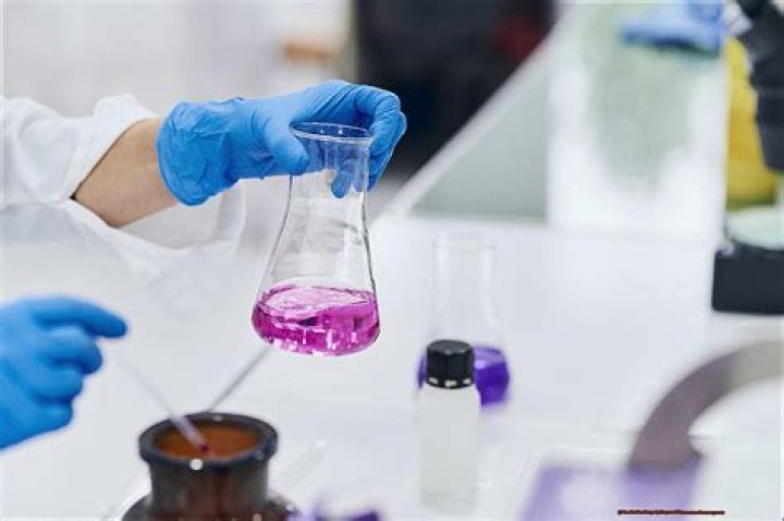 How do you properly dispose of potassium permanganate