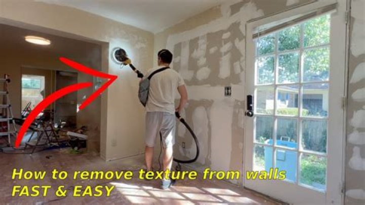 How do you remove mounting putty from a wall?