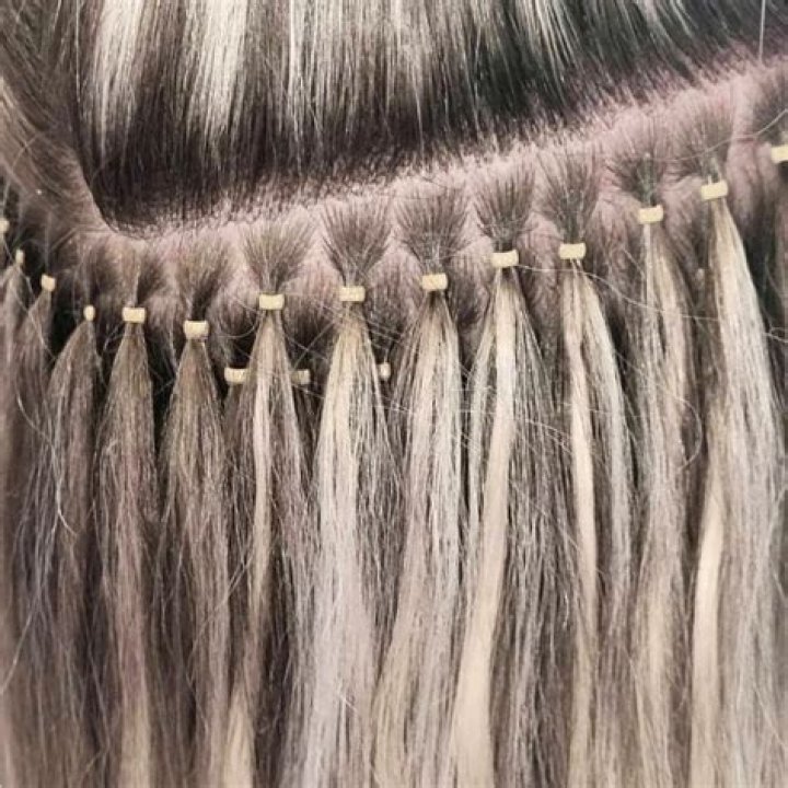 How do you sleep with microbead extensions?