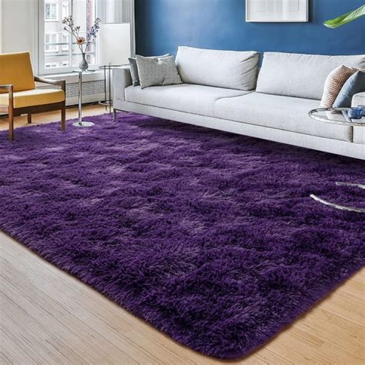 How do you vacuum a fluffy rug?