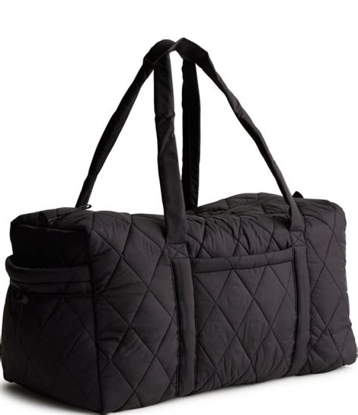How do you wash a Vera Bradley duffle bag?
