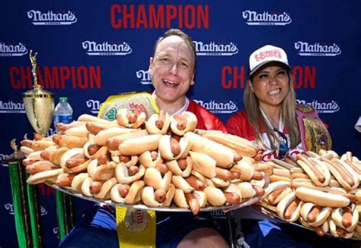 How does Nathan's cook their hotdogs?