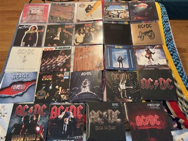 How many albums did journey escape sell?
