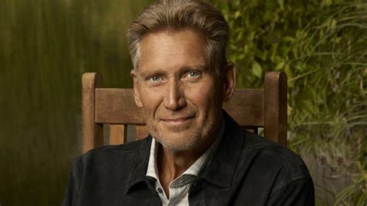 How old was the author at that time the outsiders?