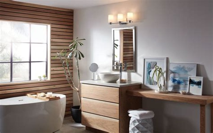 Should bathroom sconces point up or down?