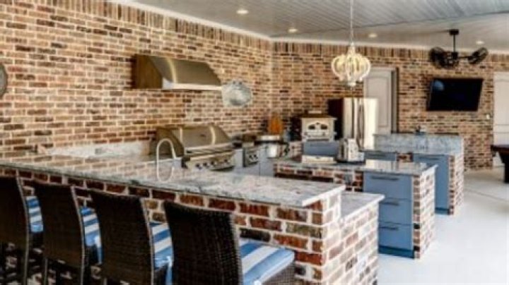 What are outdoor kitchen cabinets made from?