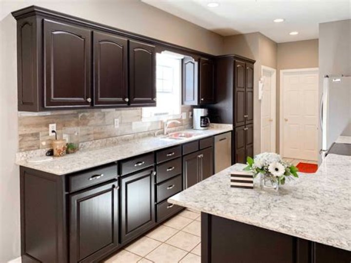 What color countertops go with brown cabinets