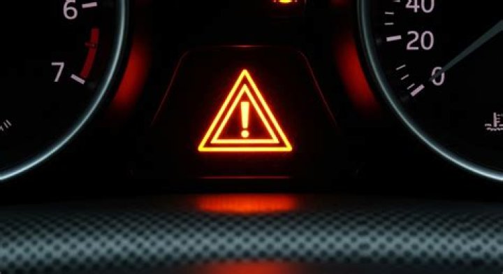 What does the exclamation mark mean on Toyota Camry?