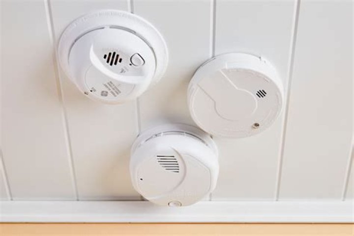 What is the difference between smoke detectors and smoke alarms