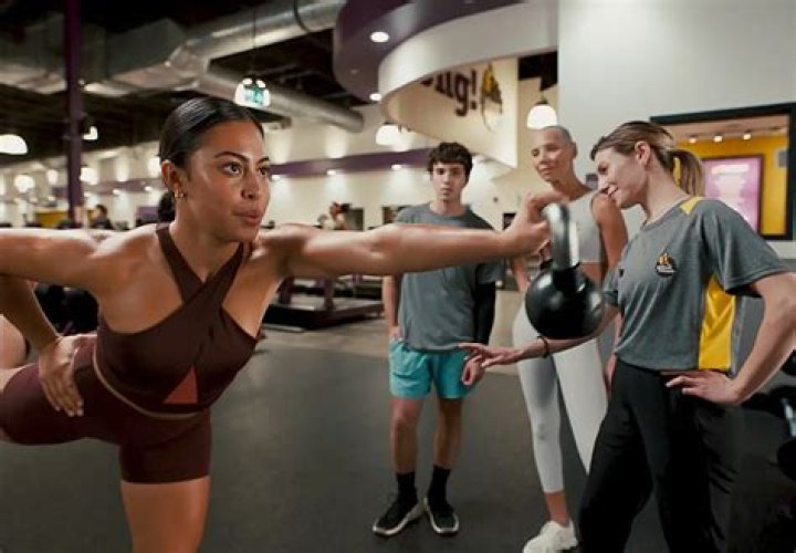 What is the startup fee for Planet Fitness?