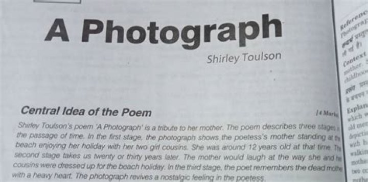 Who is the poet of a photograph?